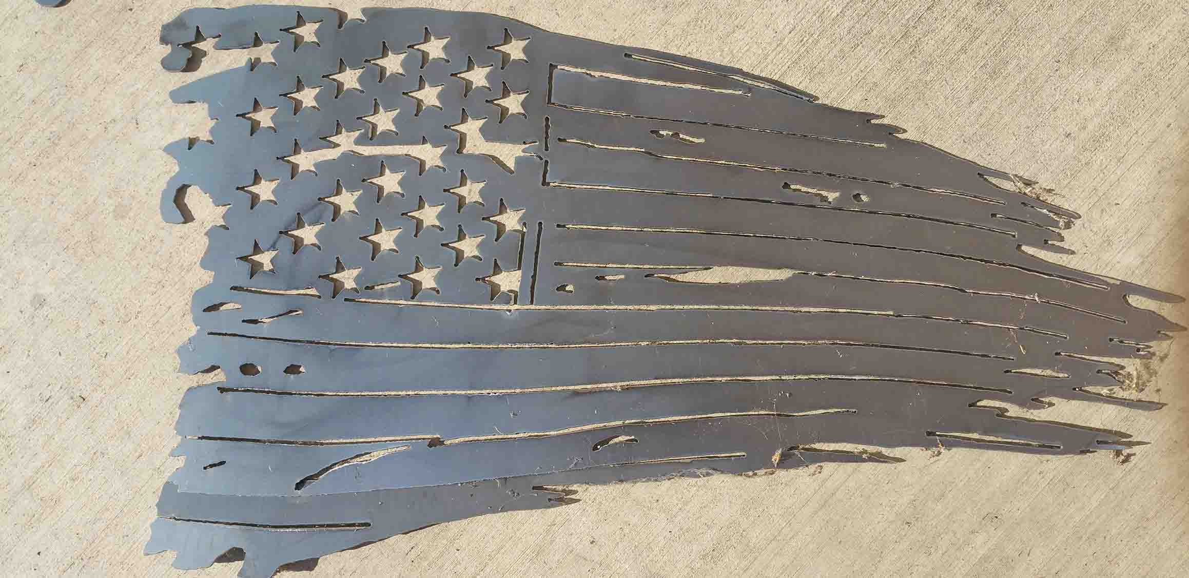 Decoration cutout of a tattered flag.